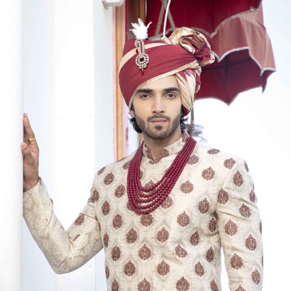 Ivory sherwani with burgundy boota embroidery all over