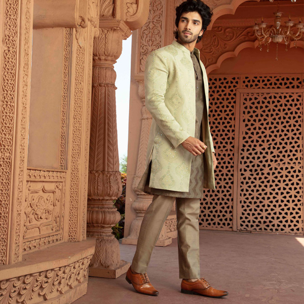 A bespoke light cilantro green open bandhgala jacket