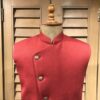 Asymmetrical burgundy jacket accessoriesed with brooch - Image 3