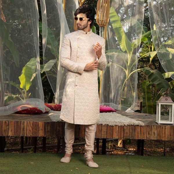 Peach puff sherwani with crystal embellishment all over