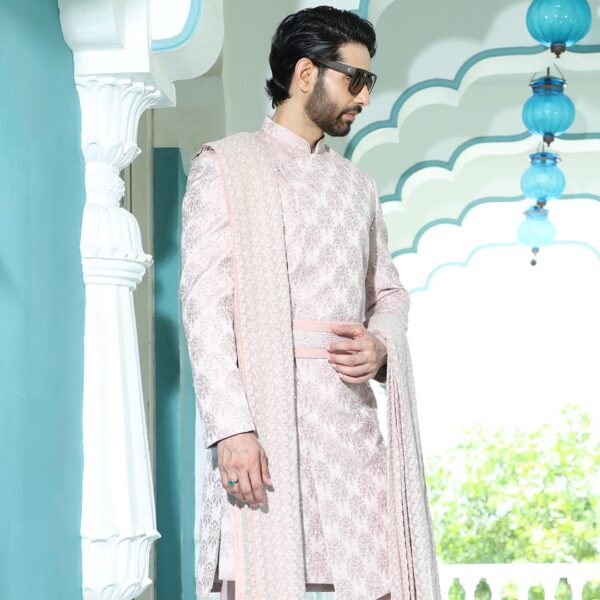 An asymmetrical cherry blossom high low cut sherwani. It is enhanced with thread and mirror work all over. - Image 4