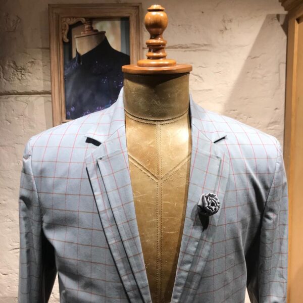 An ash grey checks blazer with single button and dual lapel. It is enhanced with two down patch pockets. - Image 3