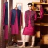 Plum color open jacket with slight round hemline. Hand embroidered flowers add style quotient to the ensemble.