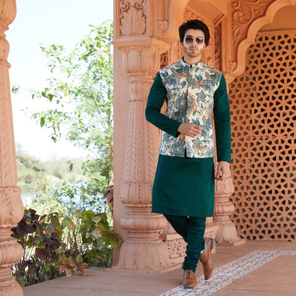 Emerald green floral  printed jacket with zardozi Japanese crane motif all over paired with emerald green kurta.