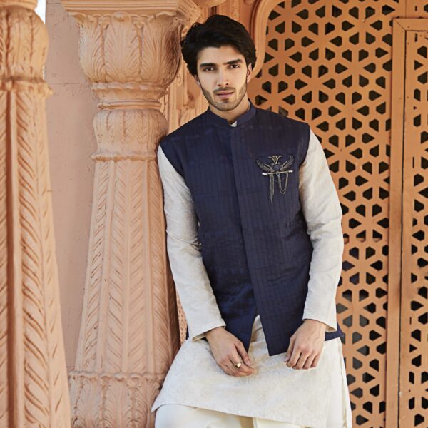 Midnight Blue assymetric Blocked jacket teamed up with time travel space embroidered off white kurta. - Image 2