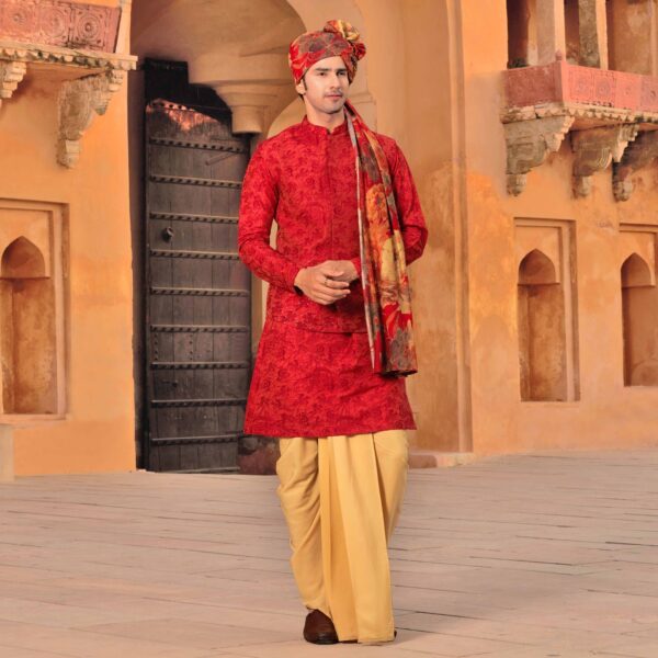 Sienna Jacket with surface detailing of Forts embroidery all over paired with matching embroidered kurta. Beige dhoti for bottoms. Accessorised with printed safa. Styled with brown loafers.