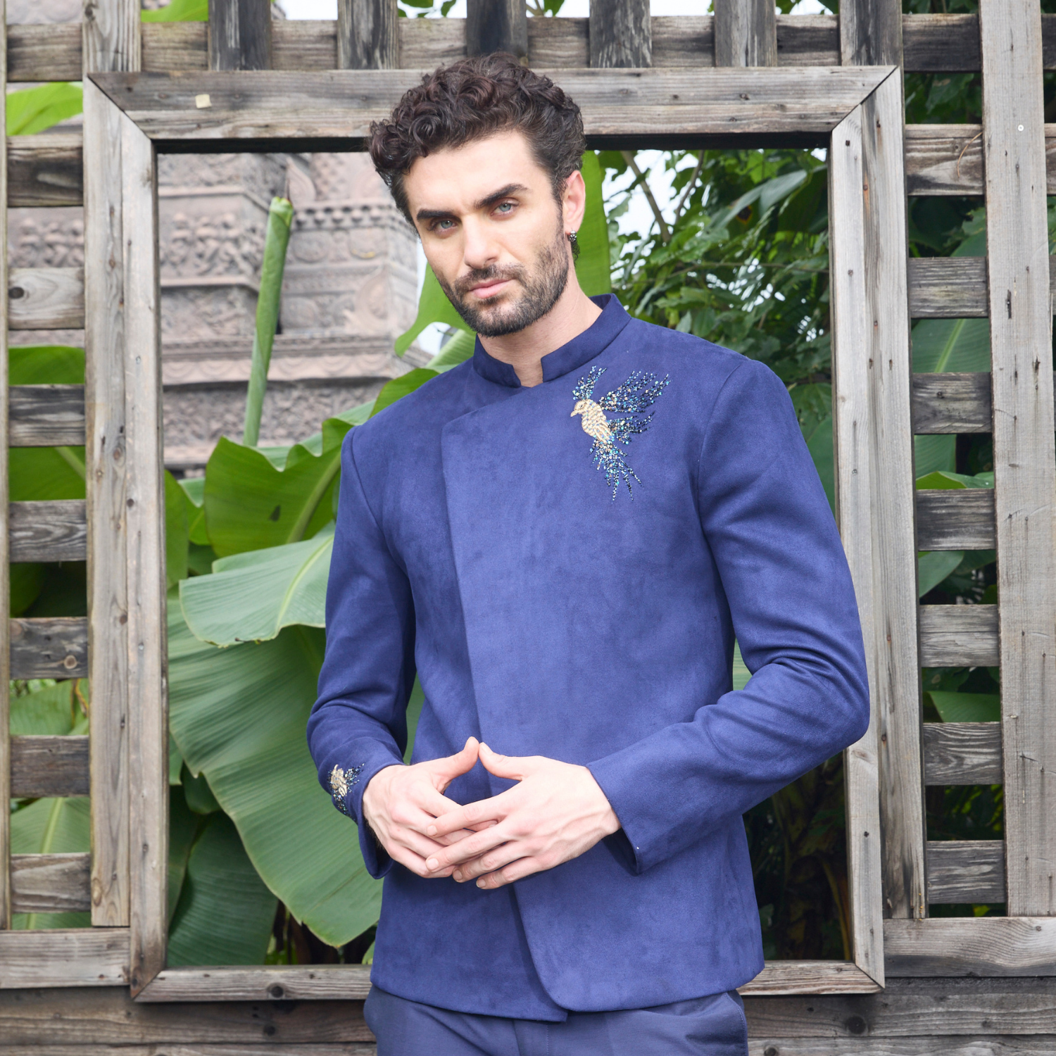 Midnight blue velvet Jodhpuri with Bird of Paradise motif on one shoulder and sleeve. Paired with matching trouser. - Image 2