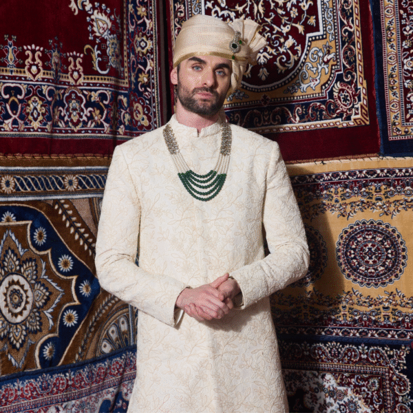 Hand embroidered pistachio Sherwani with pearl detailing all over. Paired with matching churidar. Accessorised with safa. - Image 2