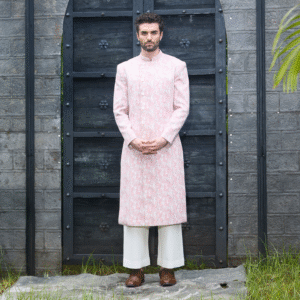 Old rose paisley printed long Bandhgala with off white trouser.