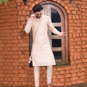 Old rose overlapping Kurta featuring Hops and Leaves embroidered & paired with matching trouser.