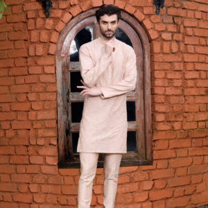 Old rose kurta with thread work highlighted on each motif & accentuated with pearl detailing. The ensemble is teamed up with old rose trouser.
