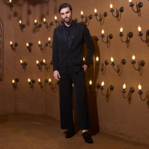 Black Tuxedo with Wings of Eternity detailing on shoulder sleeve & back.  The details are accentuated with bugle beads & sequins & paired with matching vintage shirt and trouser.
