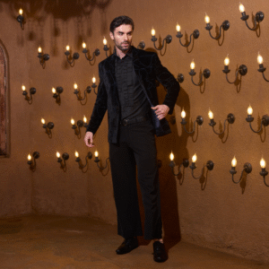 Black velvet Blazer with abstract detailing. The ensemble is paired with Vintage shirt and trouser.