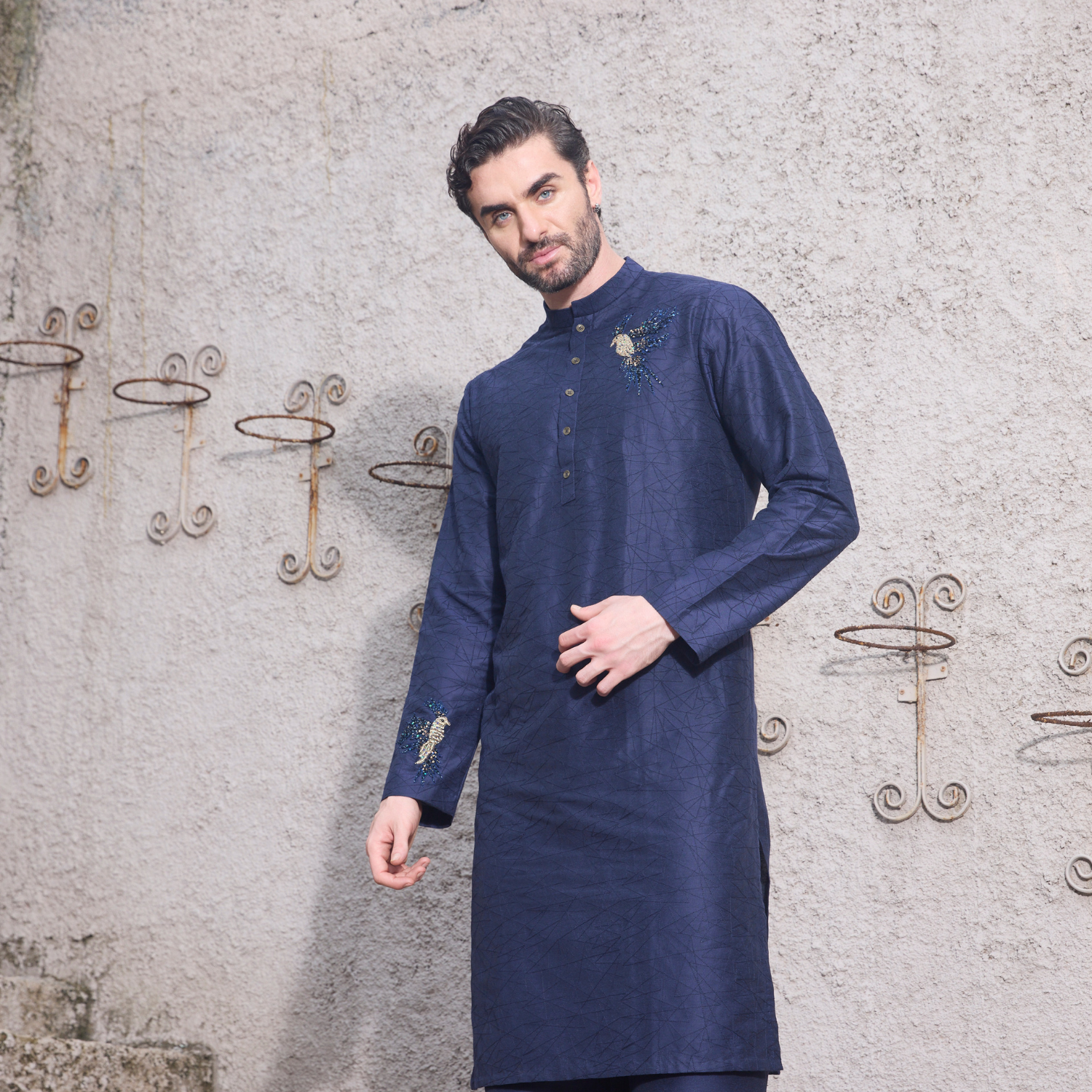 Midnight blue kurta with Birds of Paradise motif embroidered with sequins & thread on one shoulder and sleeves. Paired with midnight blue trouser. - Image 2