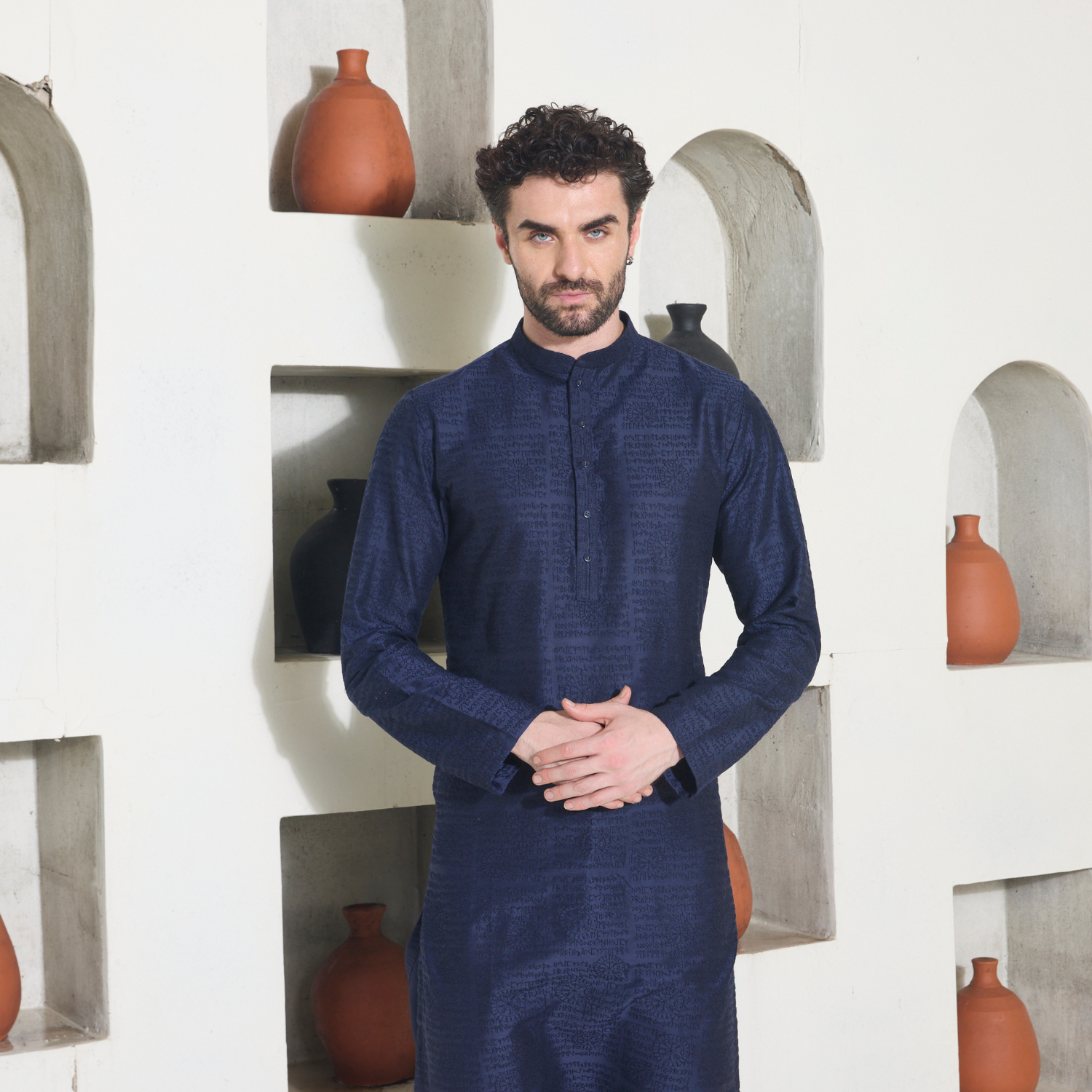 Midnight blue Kurta with all over surface detailing of Runes embroidered in monotone look. The enseble is teamed up with midnight blue trousers. - Image 2