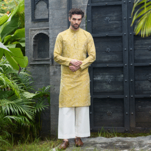 Guacamole colour Kurta with all over surface detailing of Medieval embroidery in monotone look. The enseble is teamed up with matching trousers.
