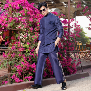 Midnight blue Hopsack embroidered horizontal striped jacket. Paired with matching milange embroidered short kurta and flared trouser. Accessorised with monotone fringe brooch.
