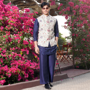 Off white floral embroided jacket. Paired with coordinated midnight blue milange embroidered short kurta. Matching flared trouser for bottom.