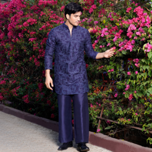 Midnight blue Milange embroidered short kurta with sequins detailing. Paired with matching flared trouser for bottom.